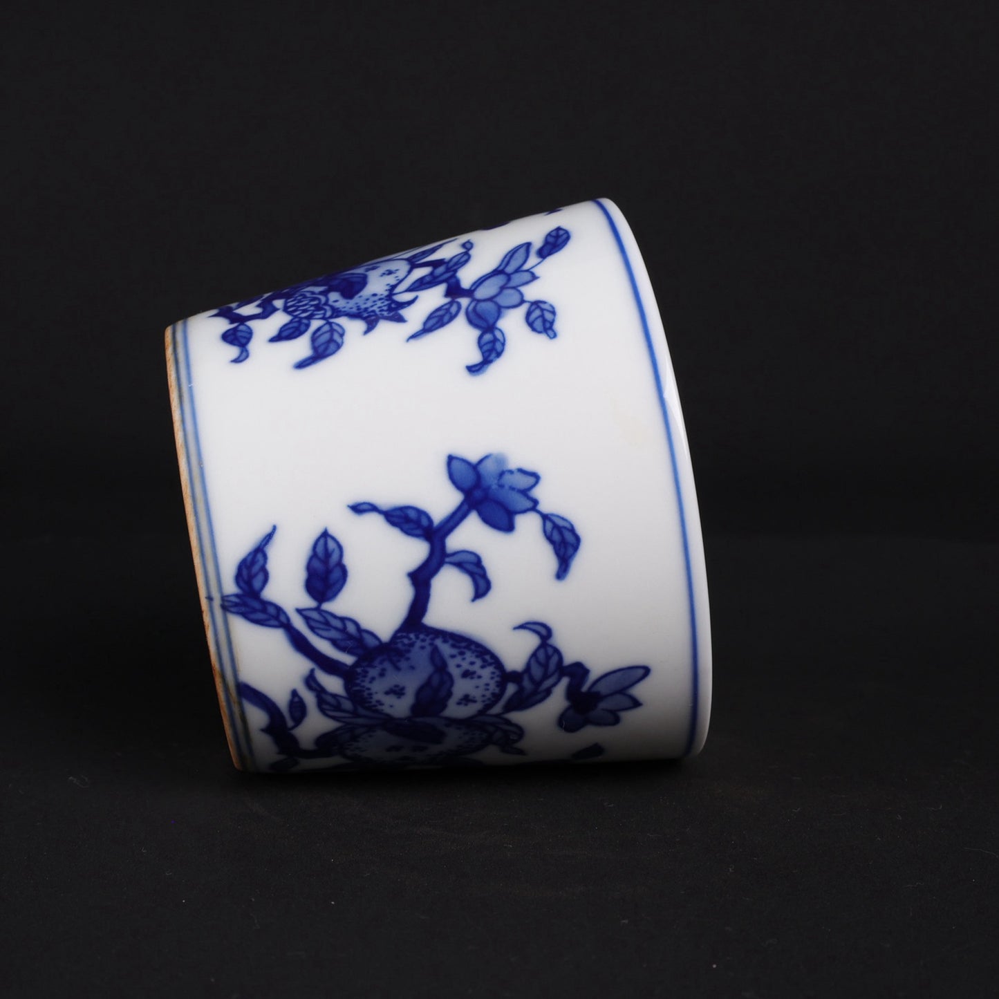 A pair of blue and white lucky, lucky, and longevity patterned cups