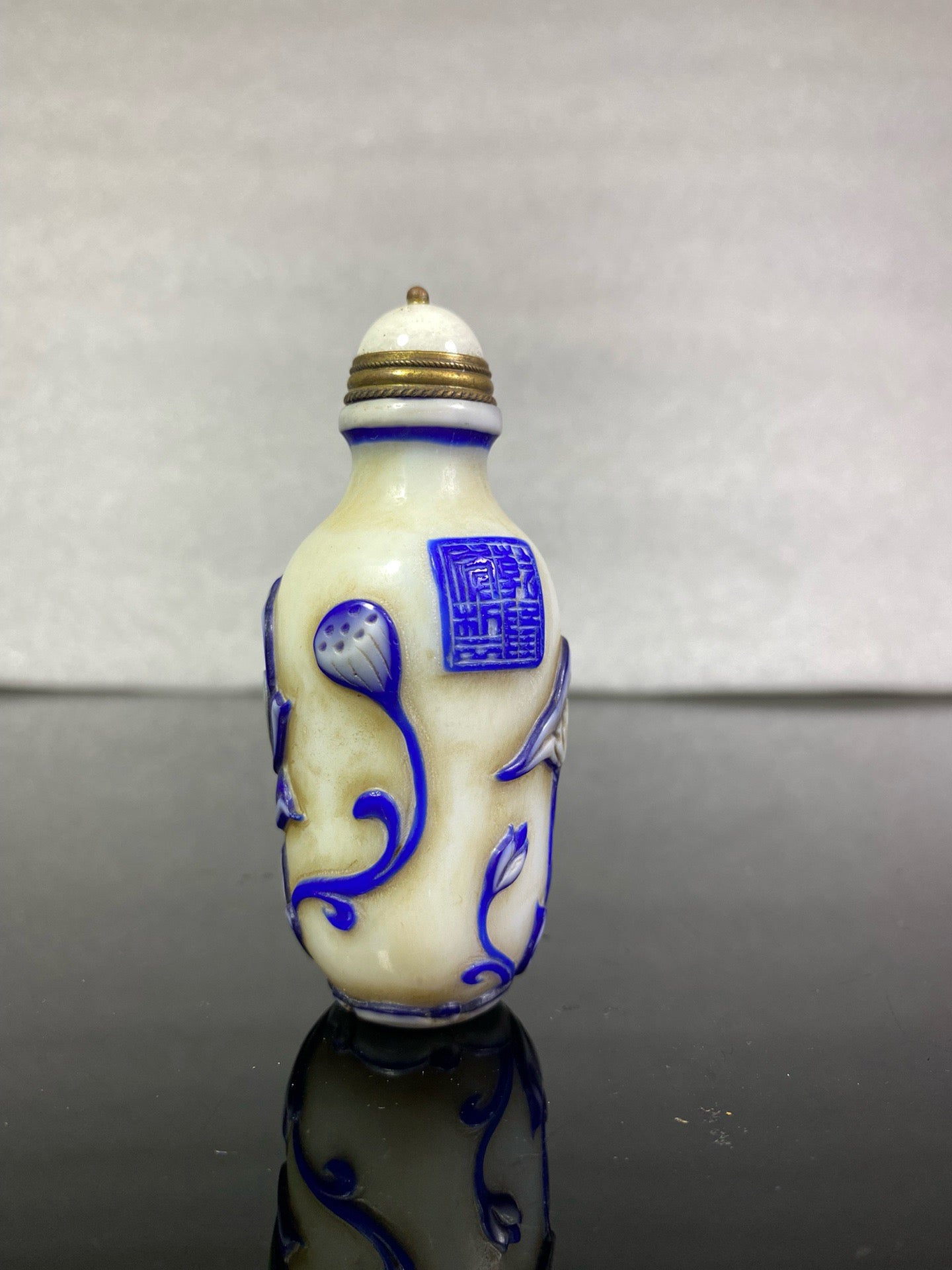 Chinese antique glass high relief carved snuff bottle