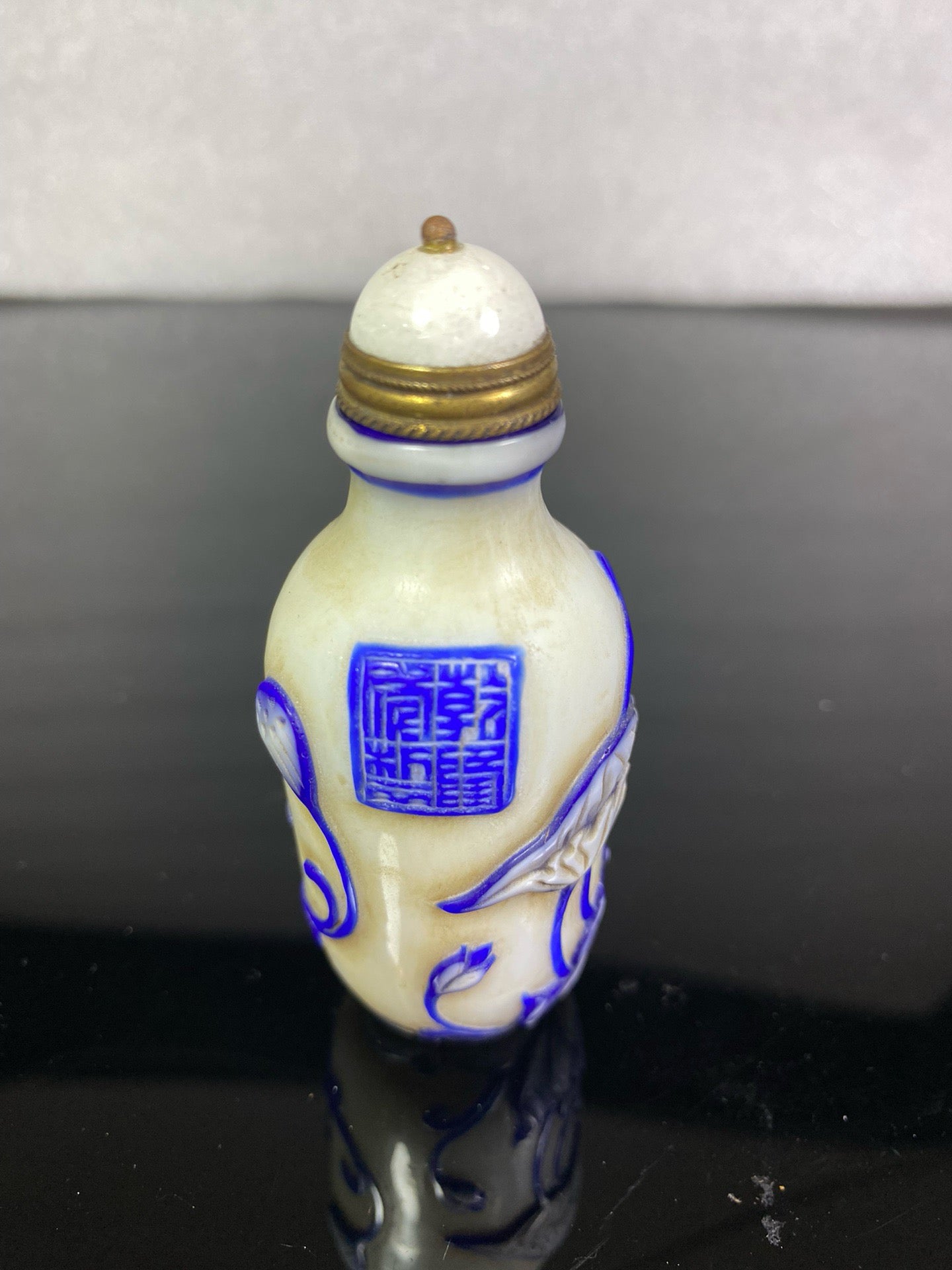 Chinese antique glass high relief carved snuff bottle