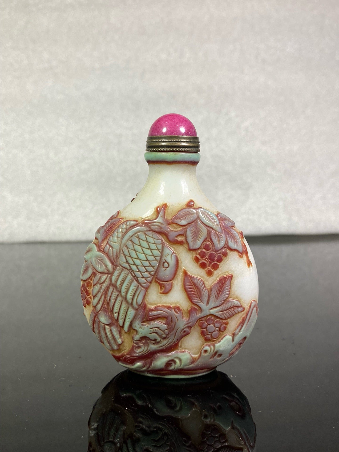 Chinese antique glass high relief carved snuff bottle