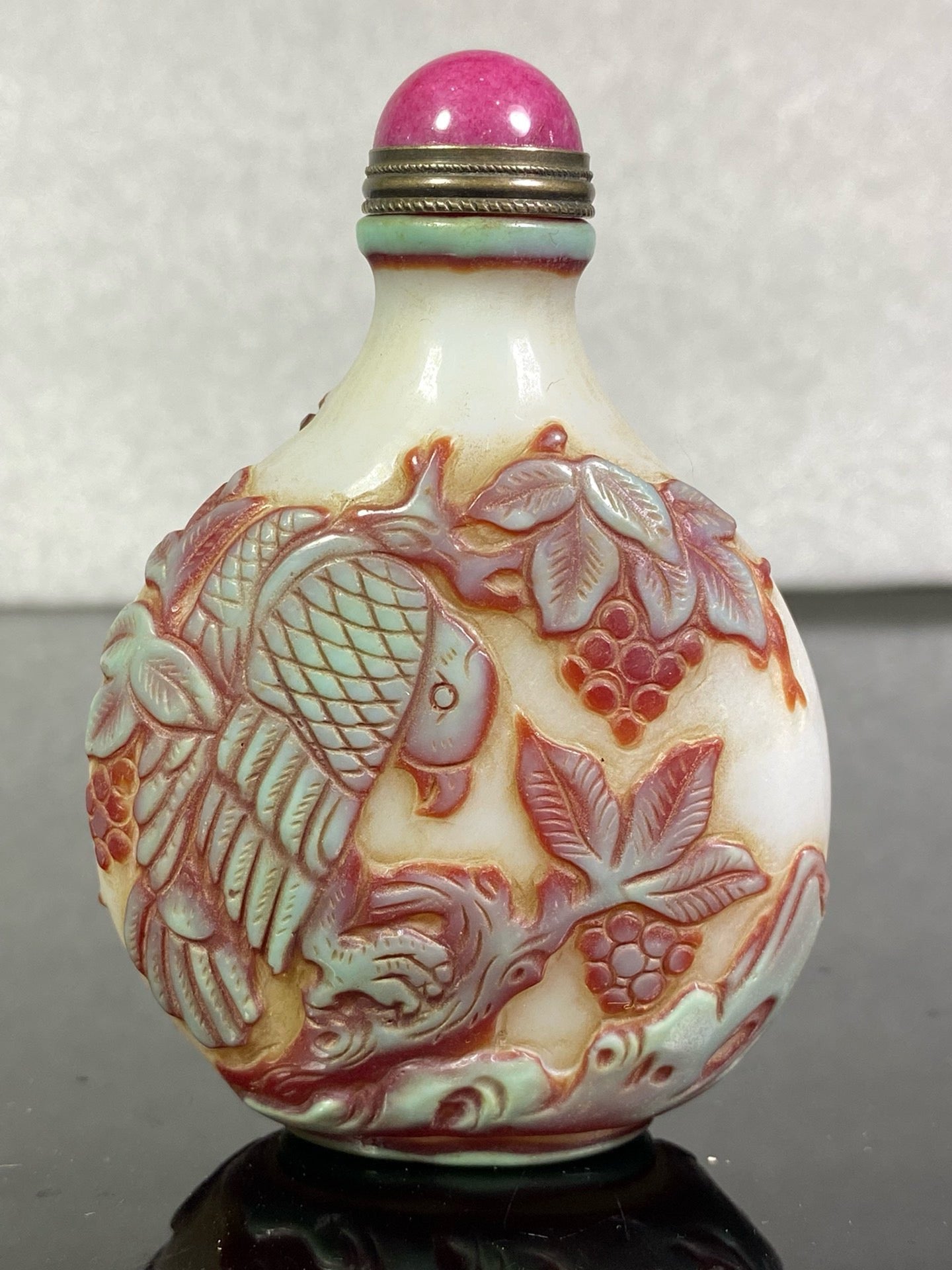 Chinese antique glass high relief carved snuff bottle