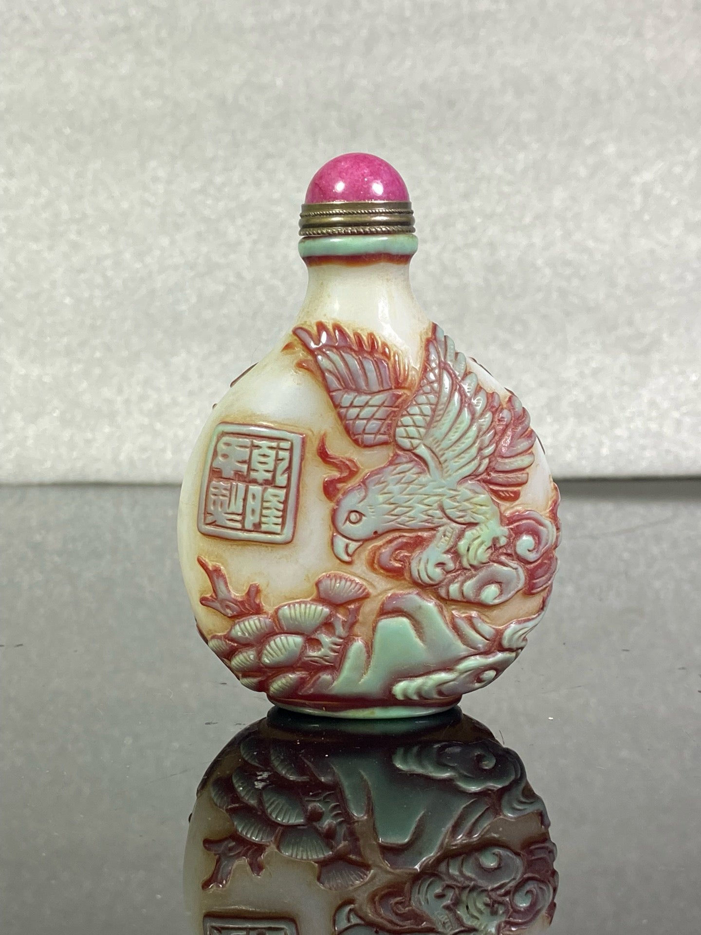 Chinese antique glass high relief carved snuff bottle