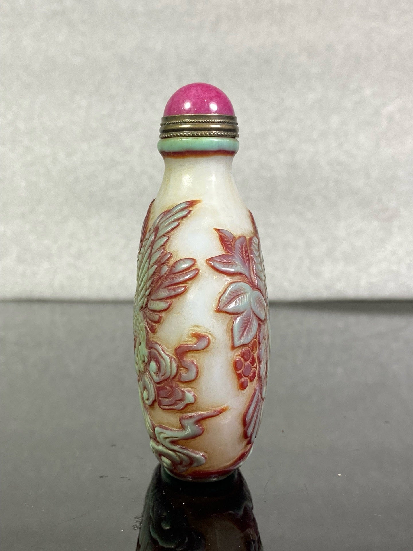 Chinese antique glass high relief carved snuff bottle