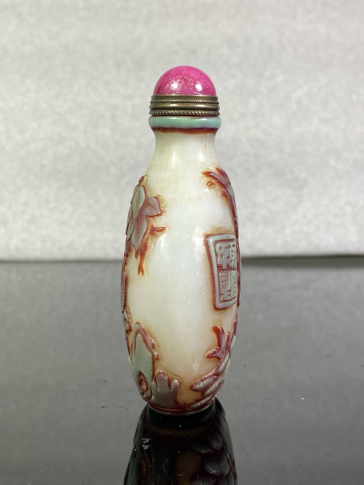 Chinese antique glass high relief carved snuff bottle