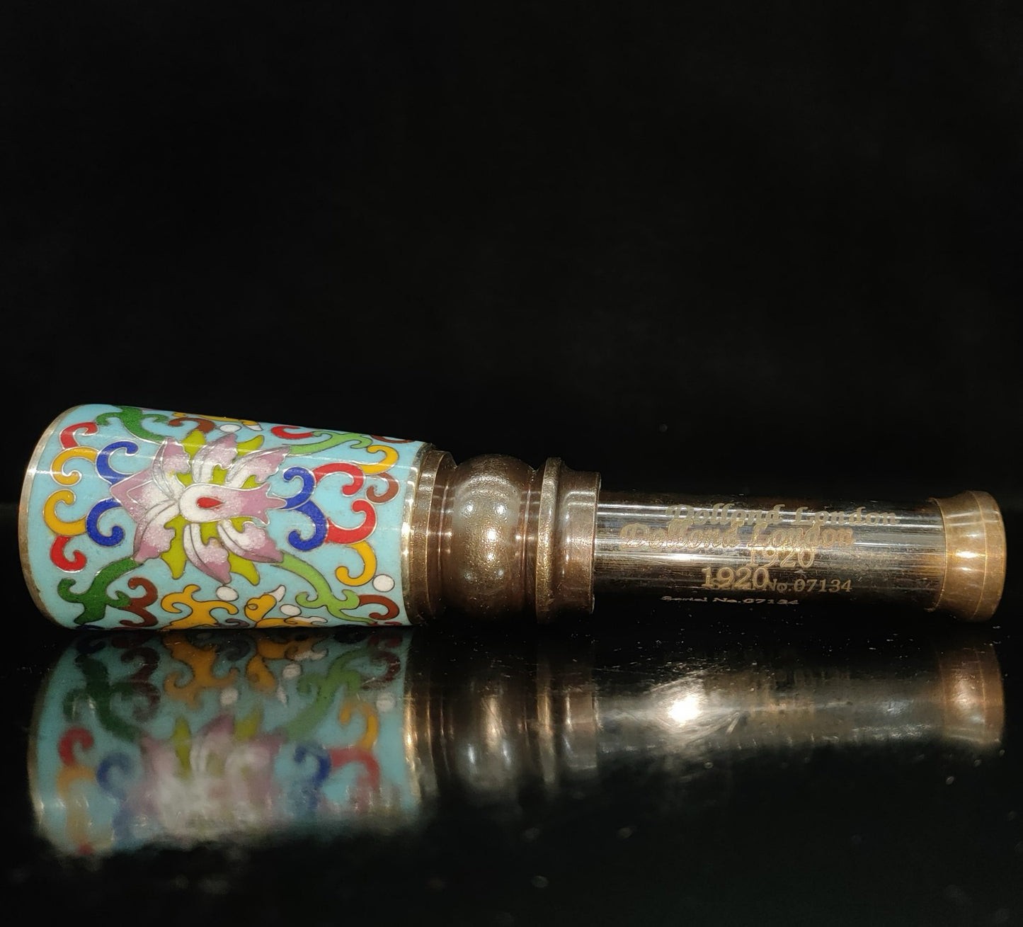 Enamel colored telescope inside wooden box