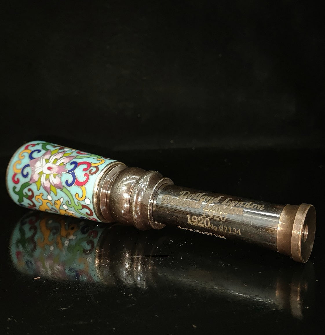 Enamel colored telescope inside wooden box