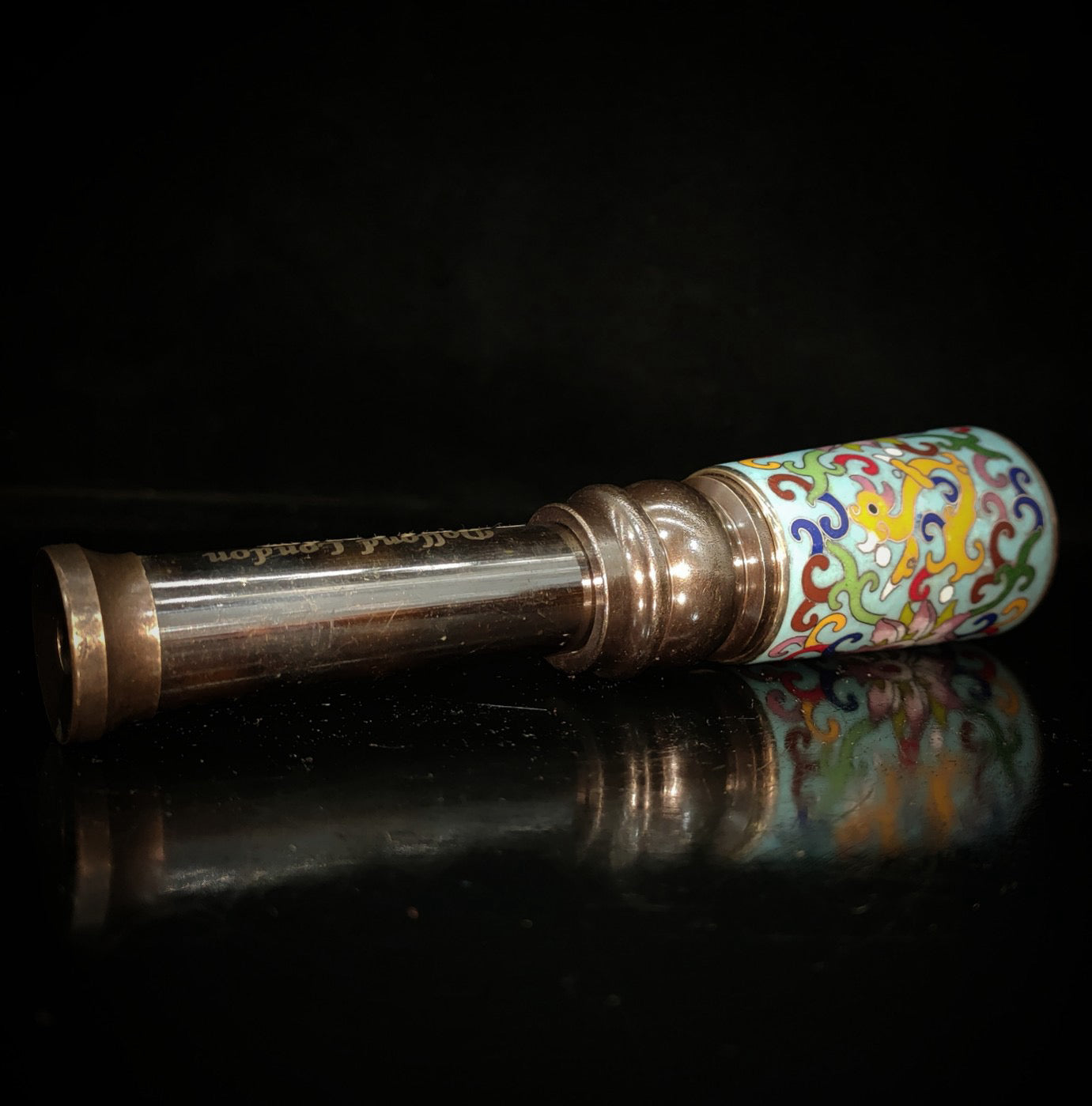 Enamel colored telescope inside wooden box