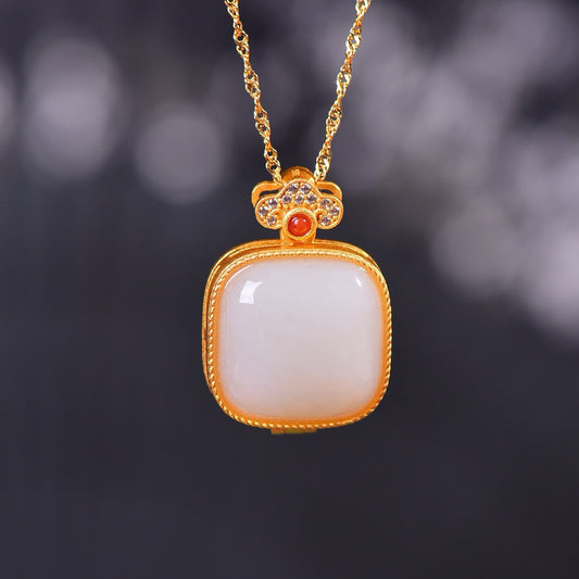 Silver inlaid Hotan Jade pendant