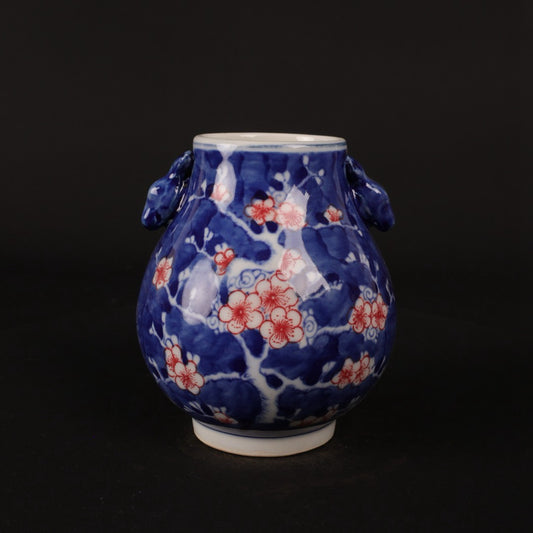 Blue and white glazed red ice plum patterned deer head statue