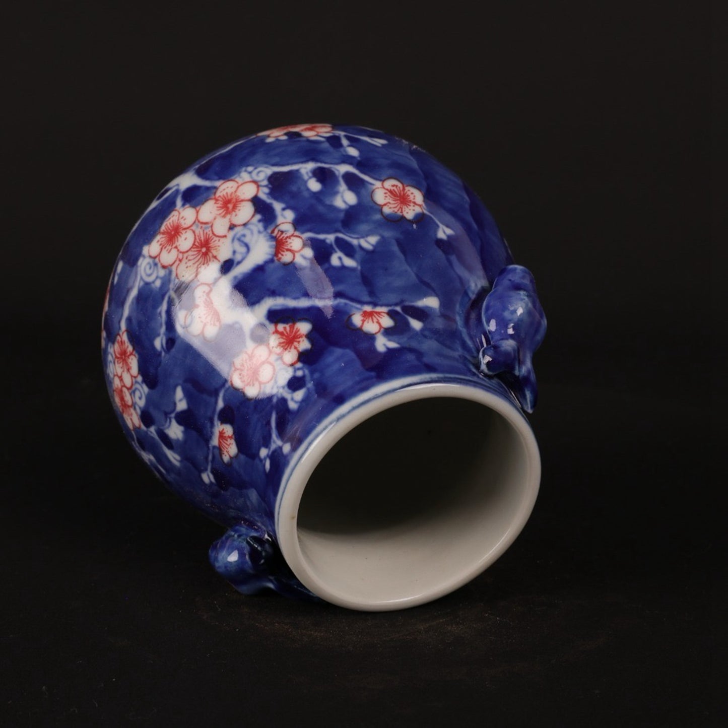 Blue and white glazed red ice plum patterned deer head statue