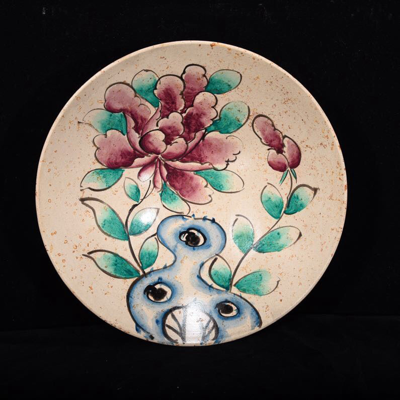 Colorful flower patterned bowl with bucket bottom
