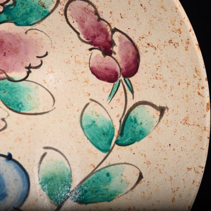 Colorful flower patterned bowl with bucket bottom