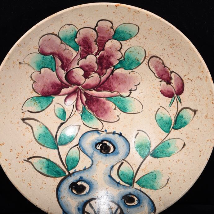 Colorful flower patterned bowl with bucket bottom