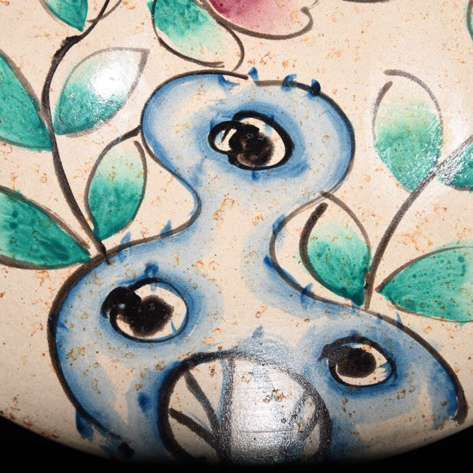Colorful flower patterned bowl with bucket bottom
