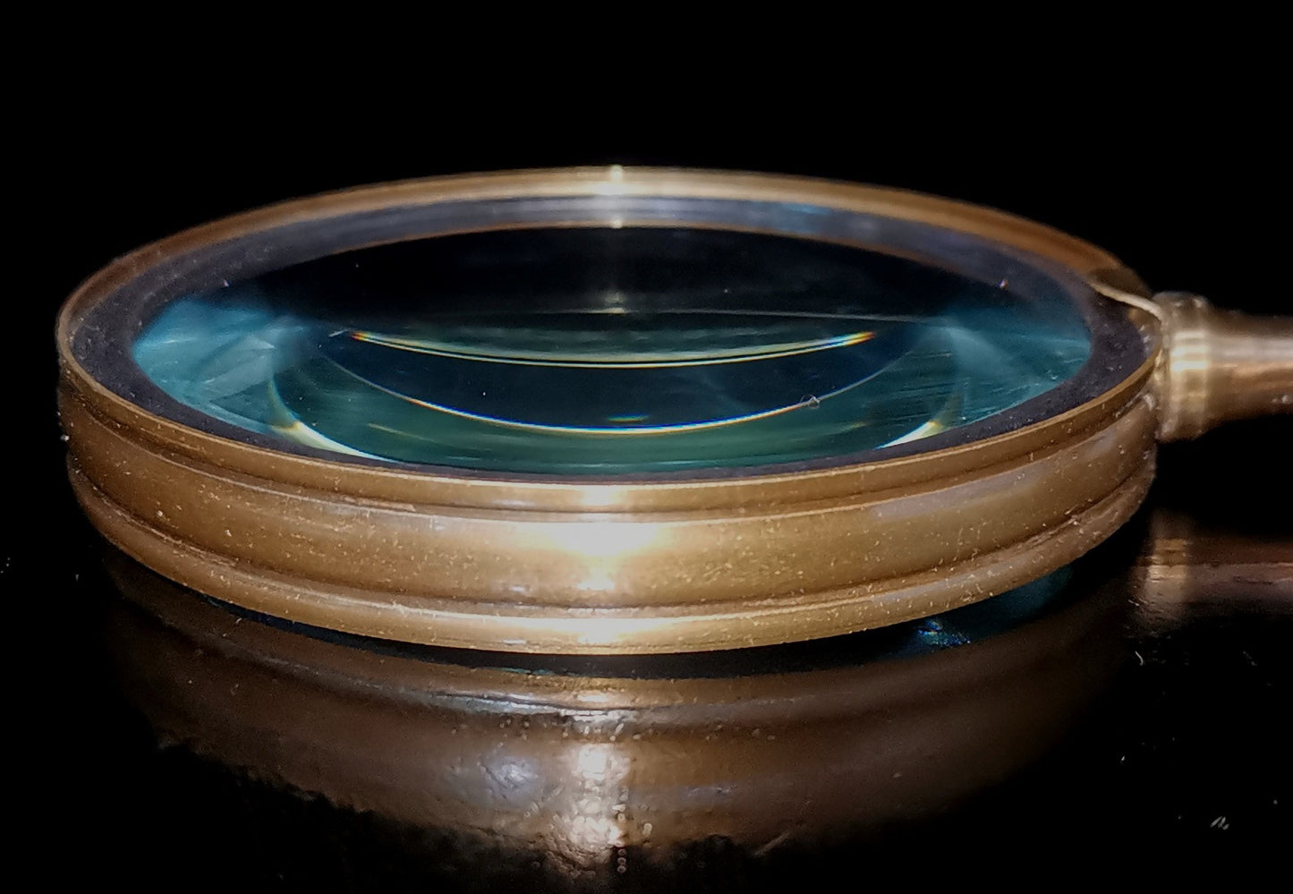 Copper inlaid seashell magnifying glass