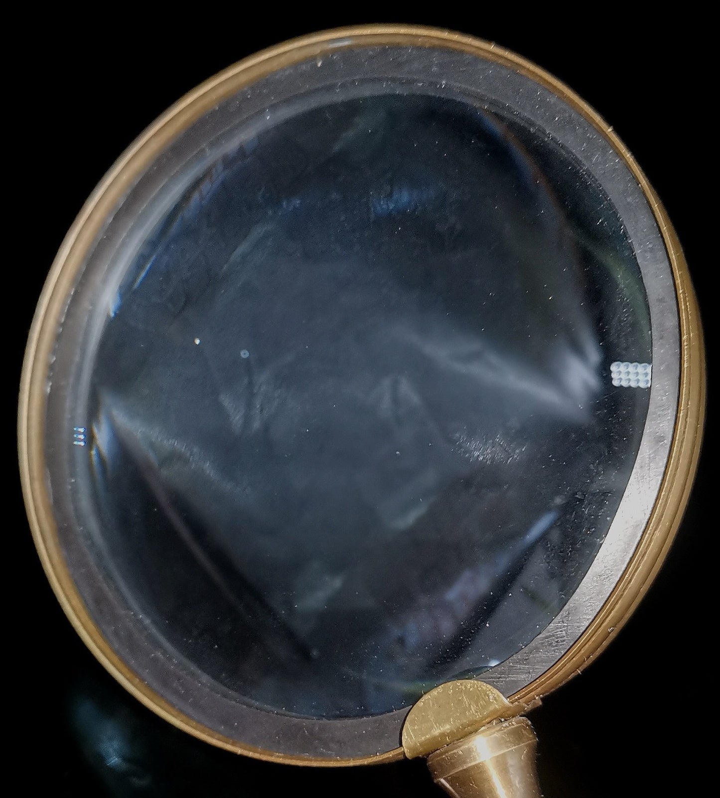 Copper inlaid seashell magnifying glass