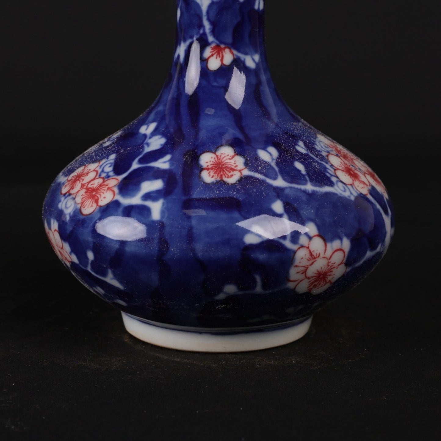 Blue and white glazed red ice plum patterned small flat belly bottle