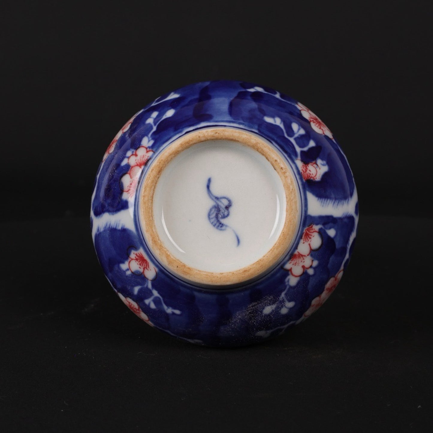 Blue and white glazed red ice plum patterned small flat belly bottle