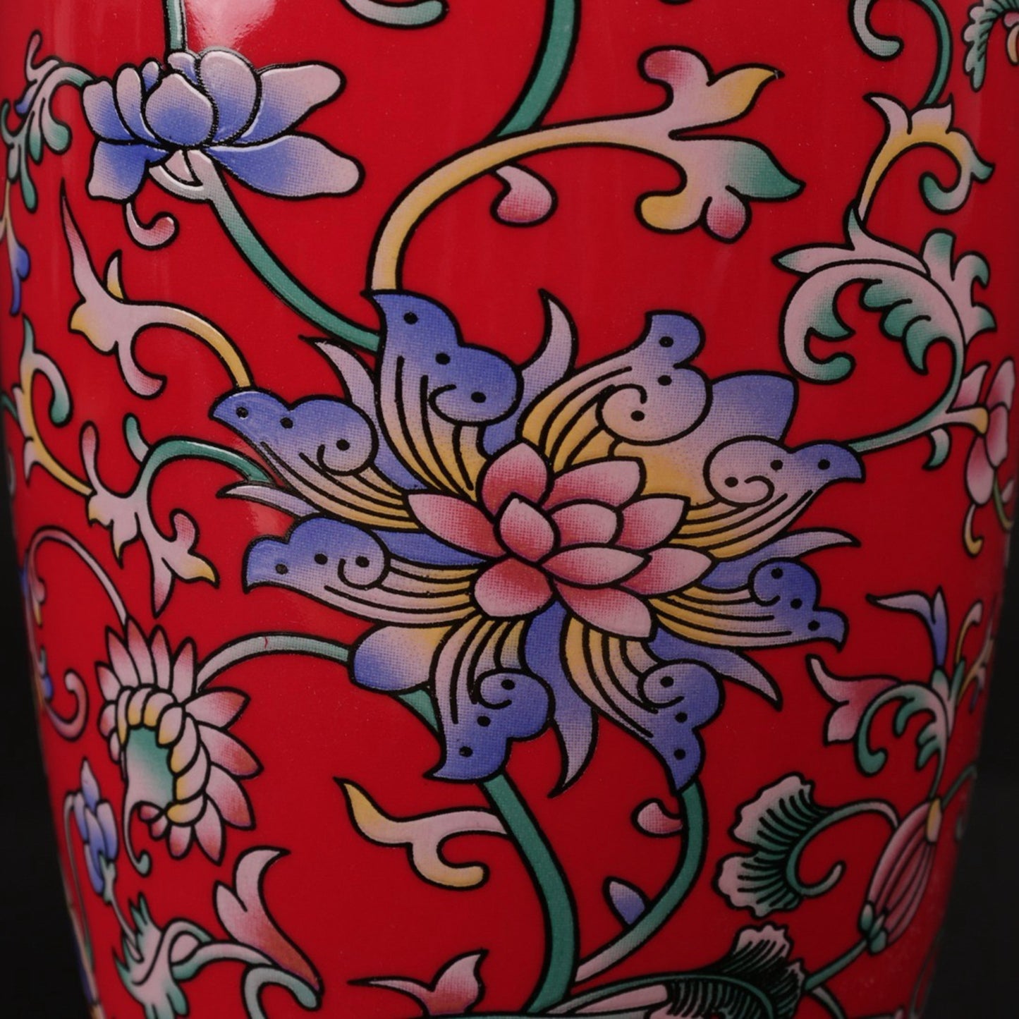 Red enamel with tangled branches and small flower arrangements