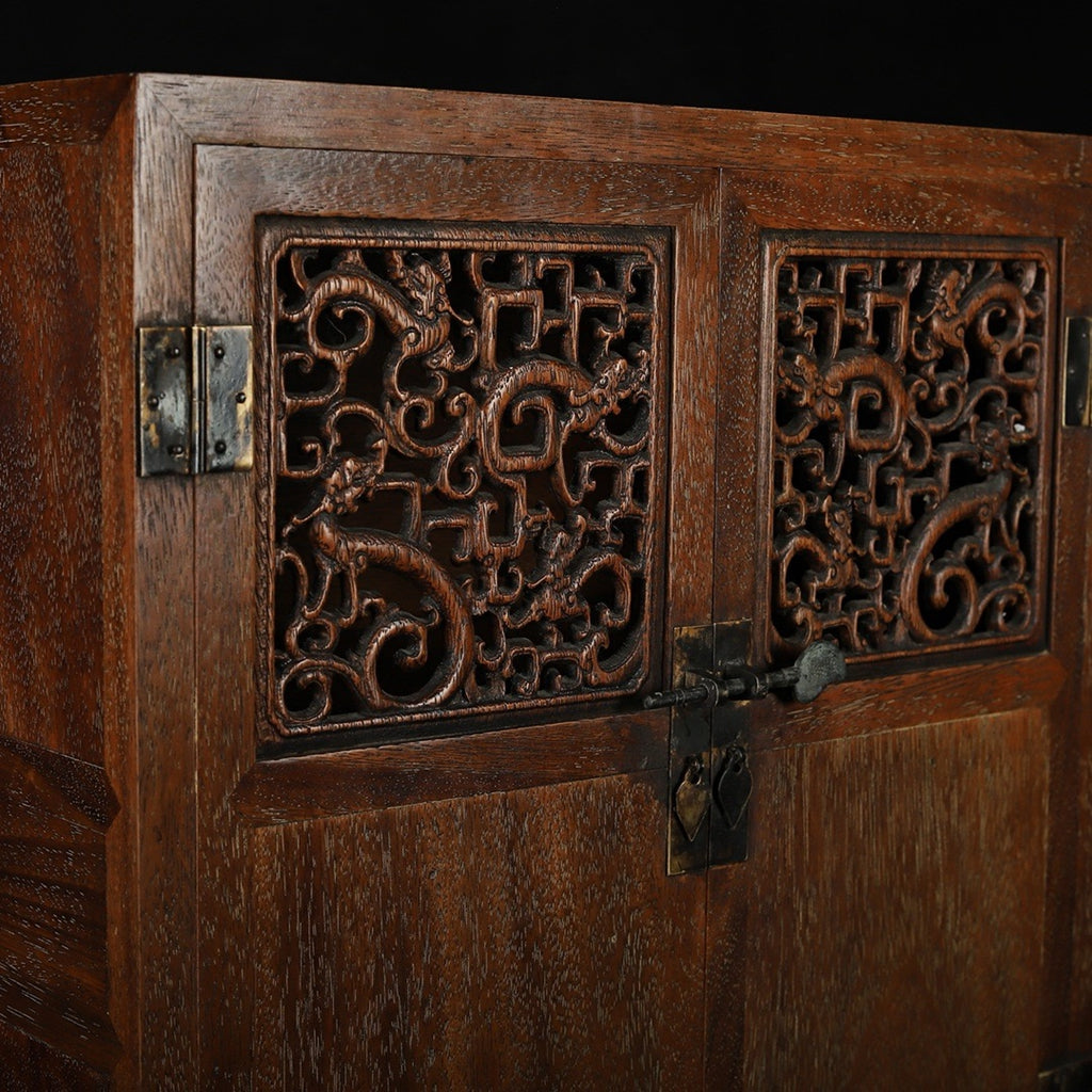 Hua Li Mu hollow carved opposite door cabinet