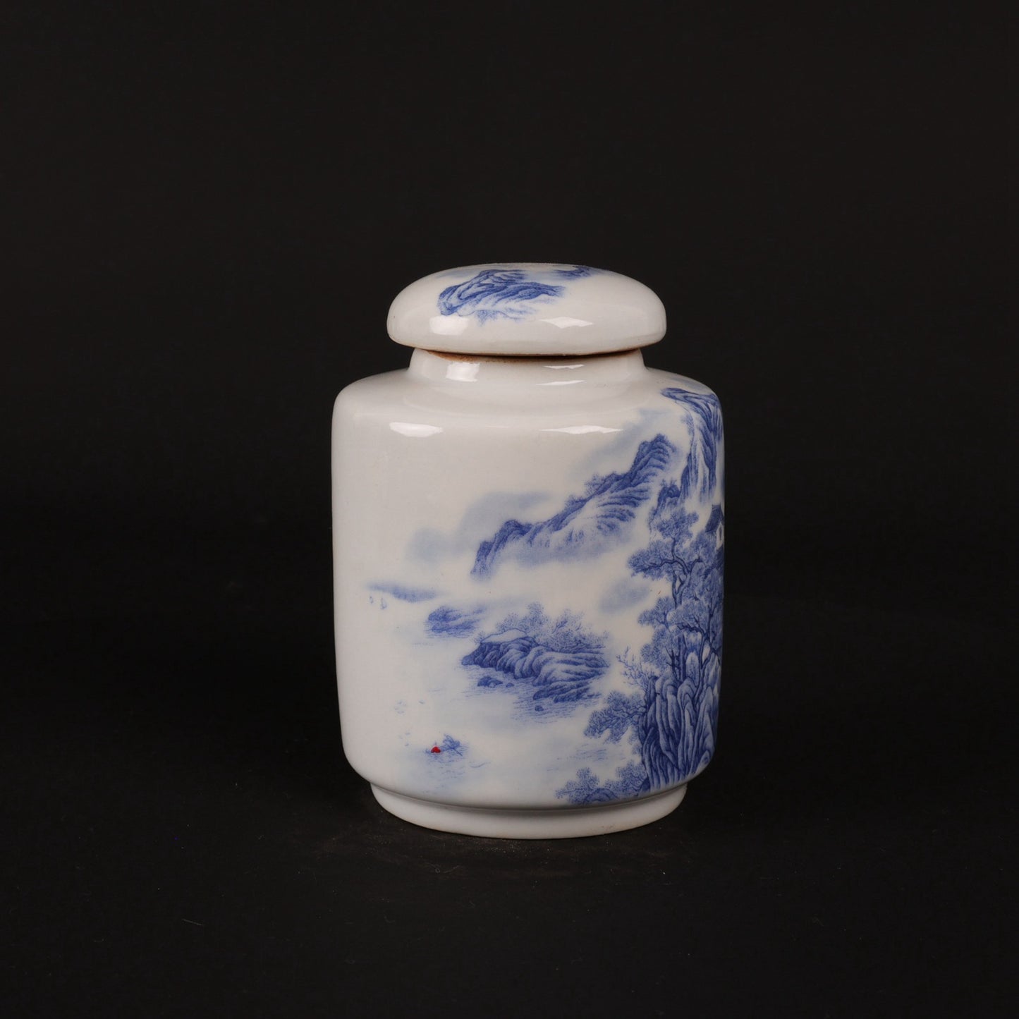 Blue and white landscape patterned tea jar