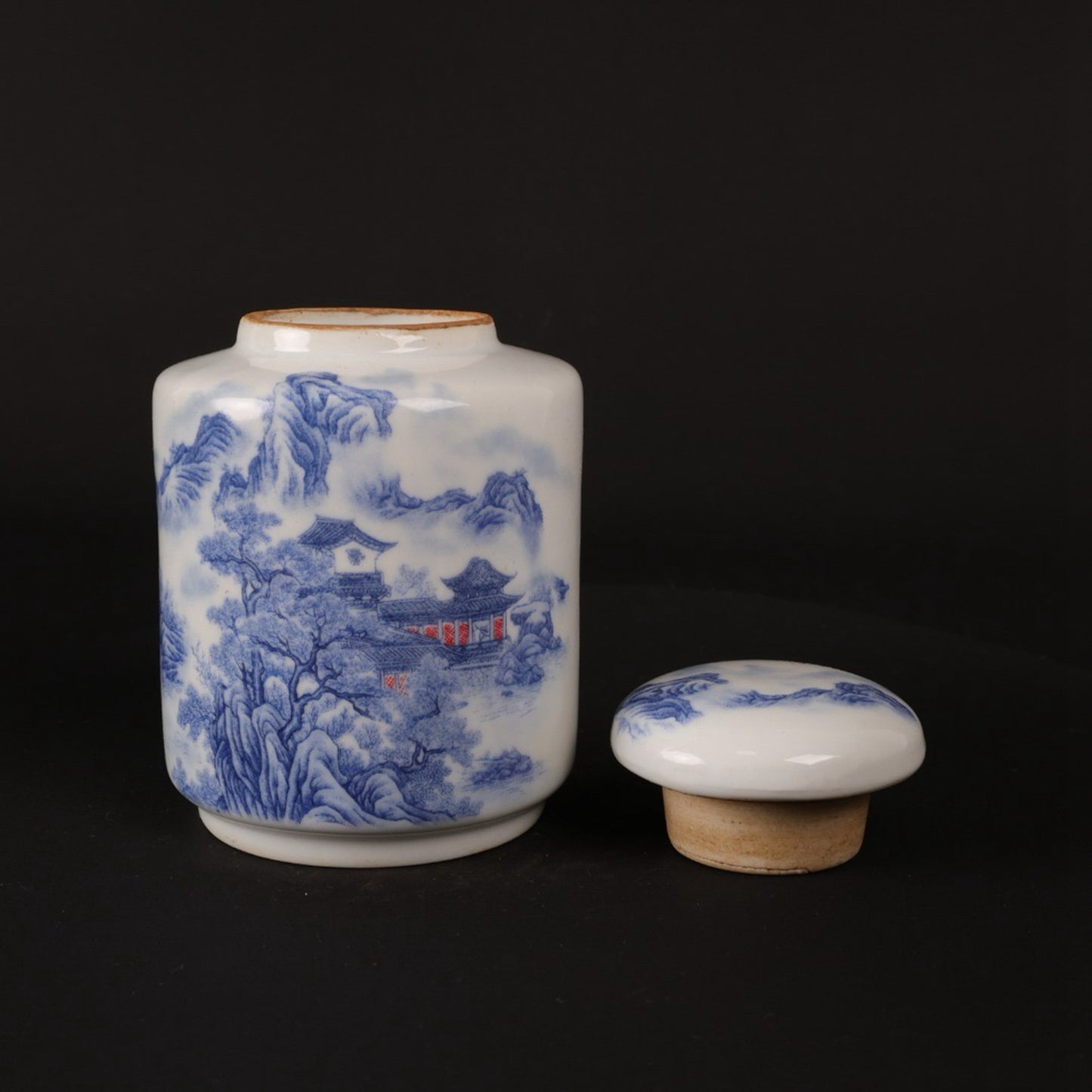 Blue and white landscape patterned tea jar