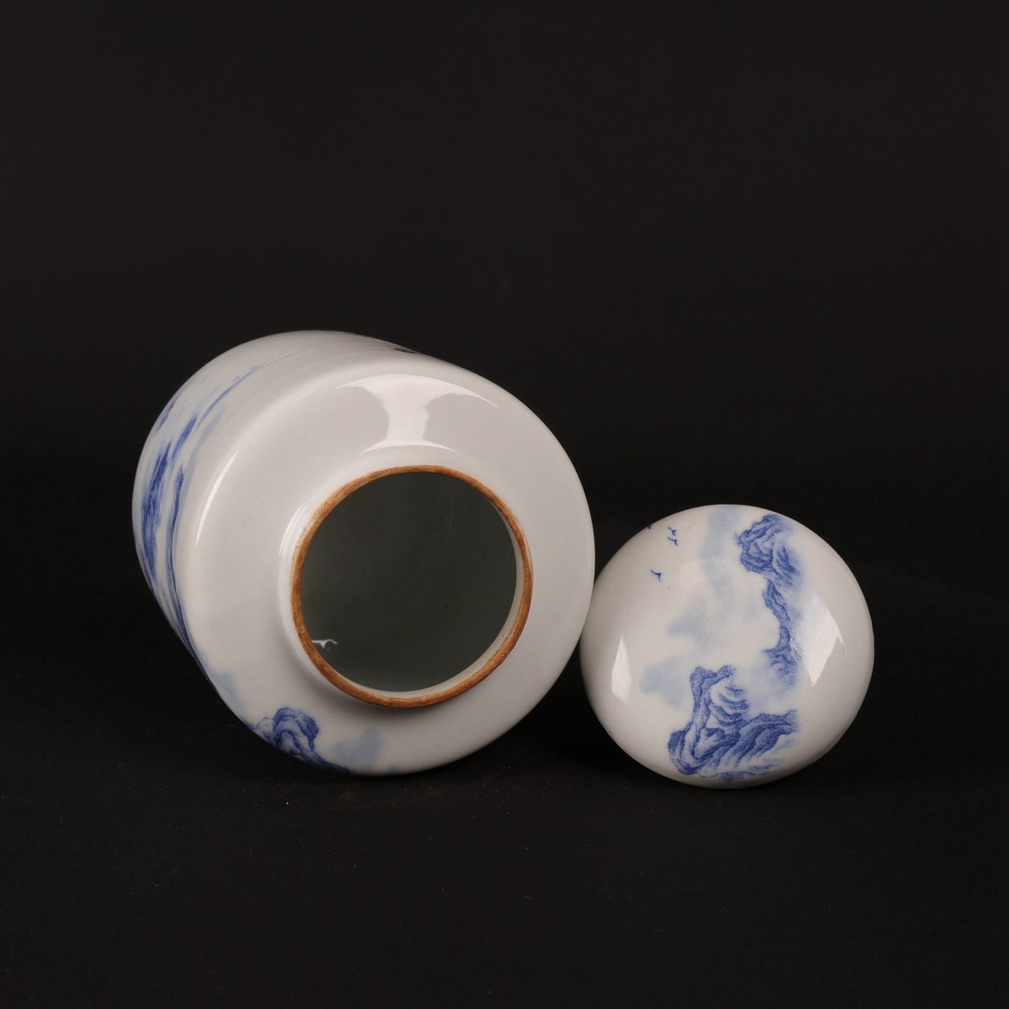 Blue and white landscape patterned tea jar