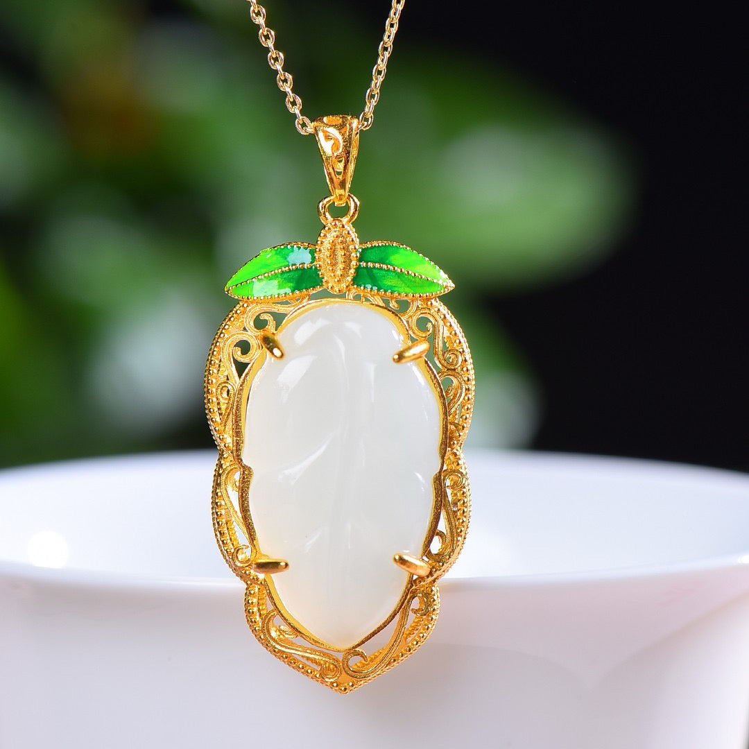 Silver inlaid Hotan Jade pendant