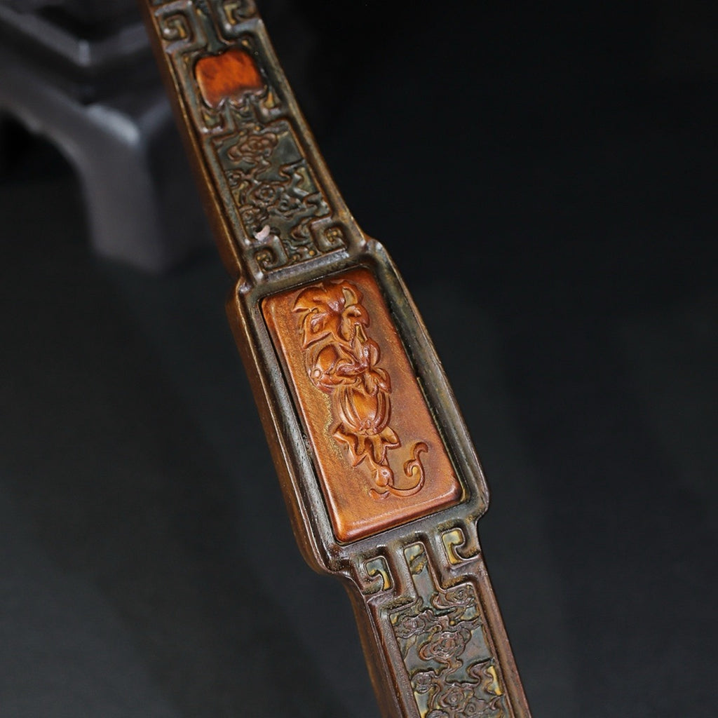 Carved rosewood auspicious cloud, melon and fruit ornaments