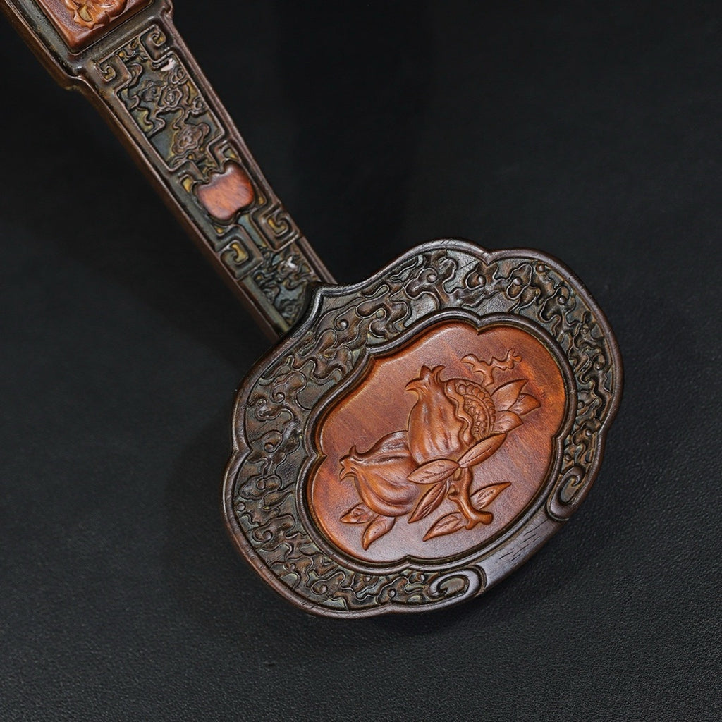 Carved rosewood auspicious cloud, melon and fruit ornaments