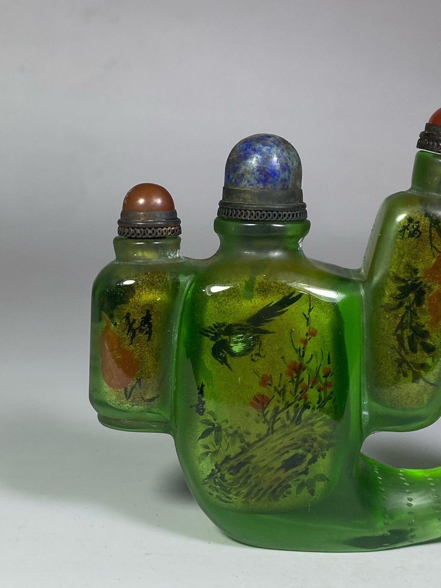 Chinese antique glazed bird shaped four groups of painted snuff bottles