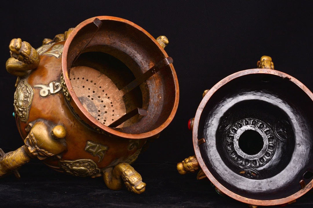 Pure handmade hammering, chiseling, and inlaying of old smoke furnaces in purple copper