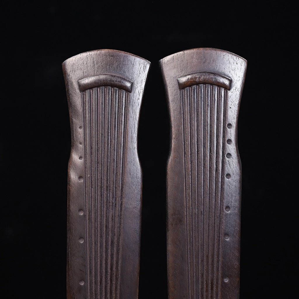 A pair of Huali wood carved Guqin weights and rulers