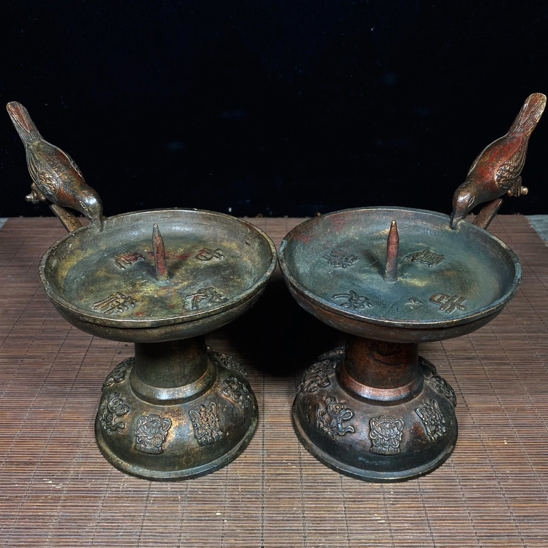 A pair of Chinese antique pure copper magpie wax stands