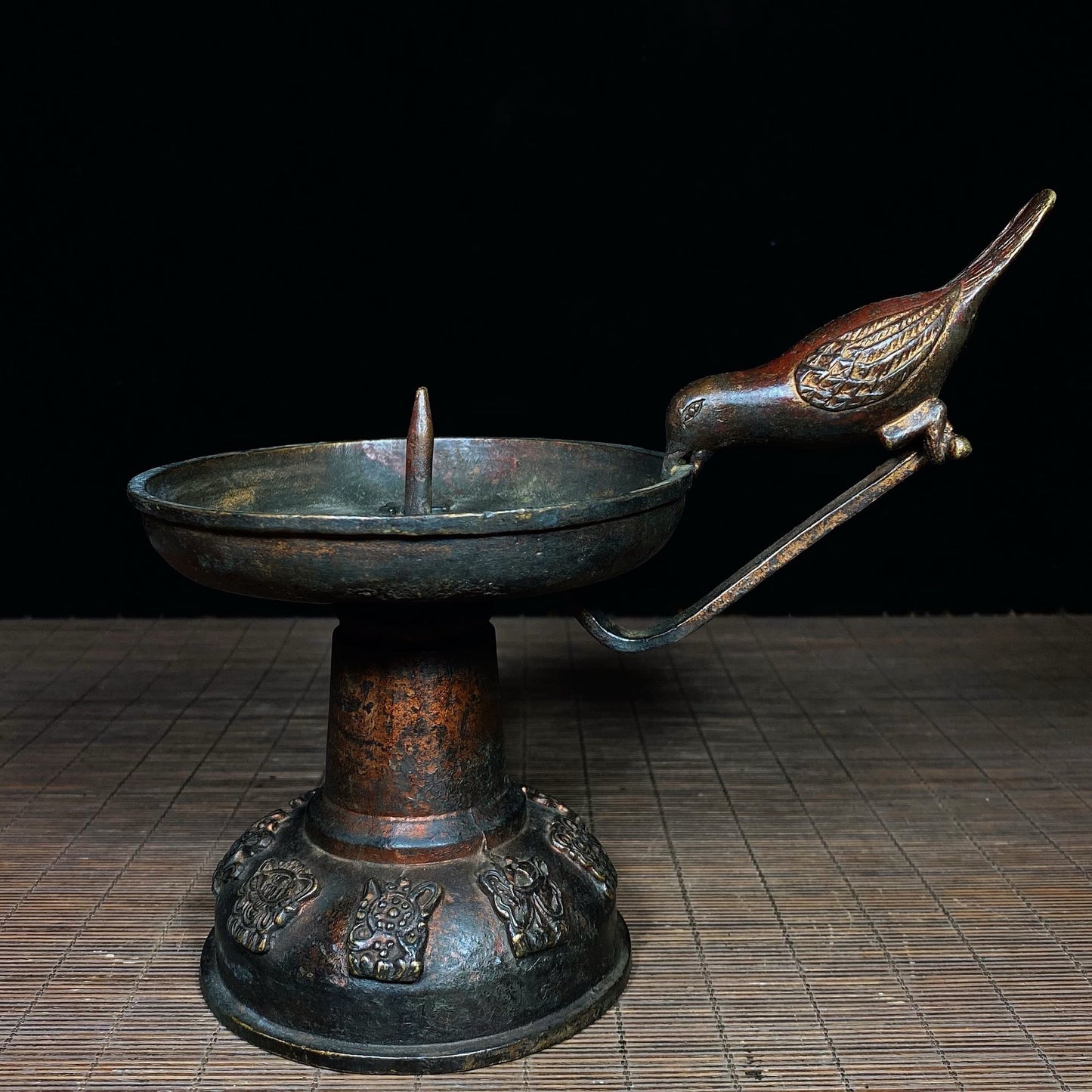 A pair of Chinese antique pure copper magpie wax stands