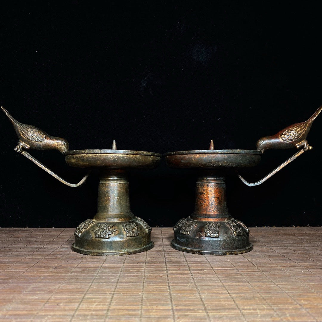 A pair of Chinese antique pure copper magpie wax stands