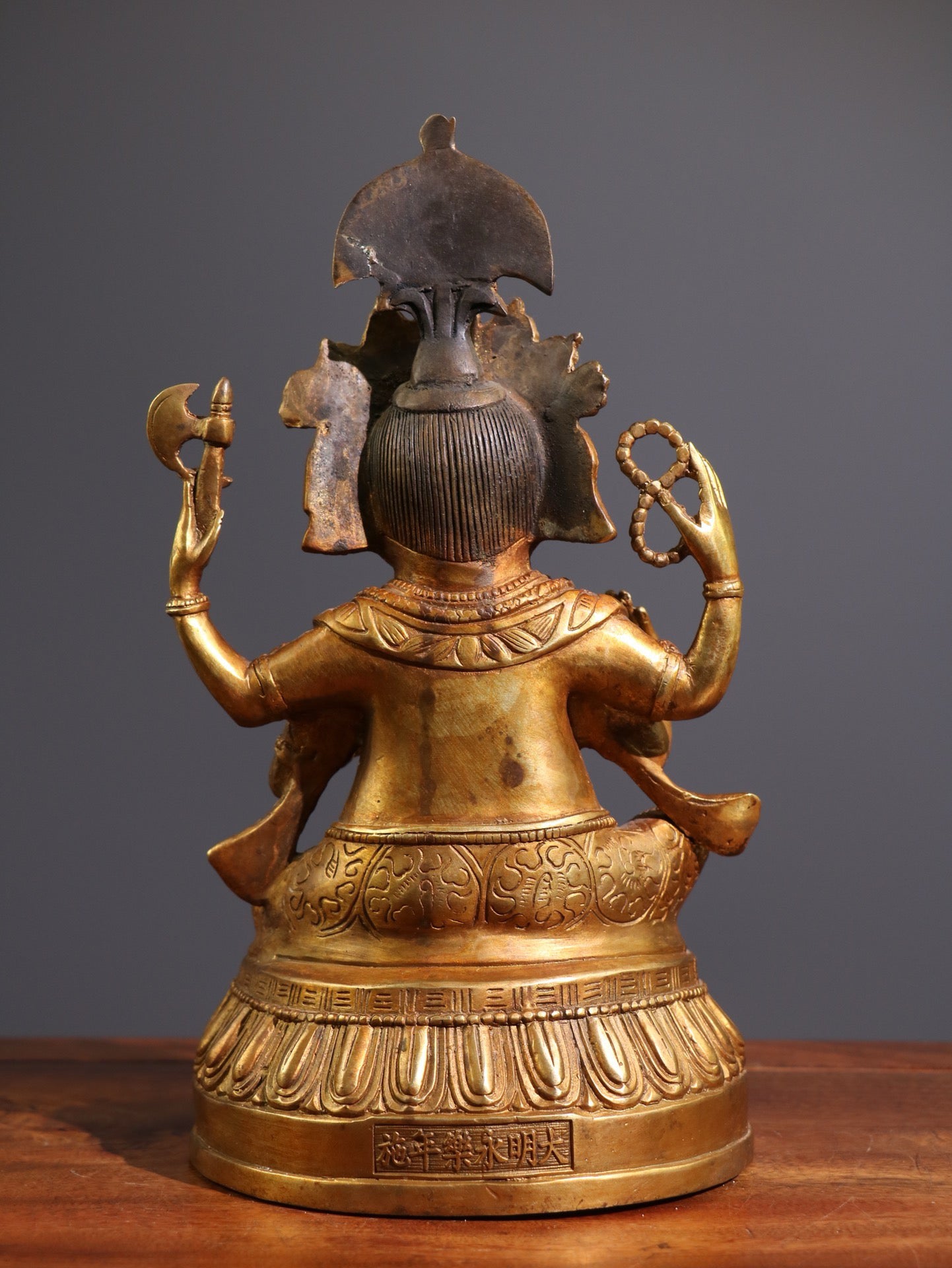 A Chinese antique pure copper statue resembling the God of Wealth