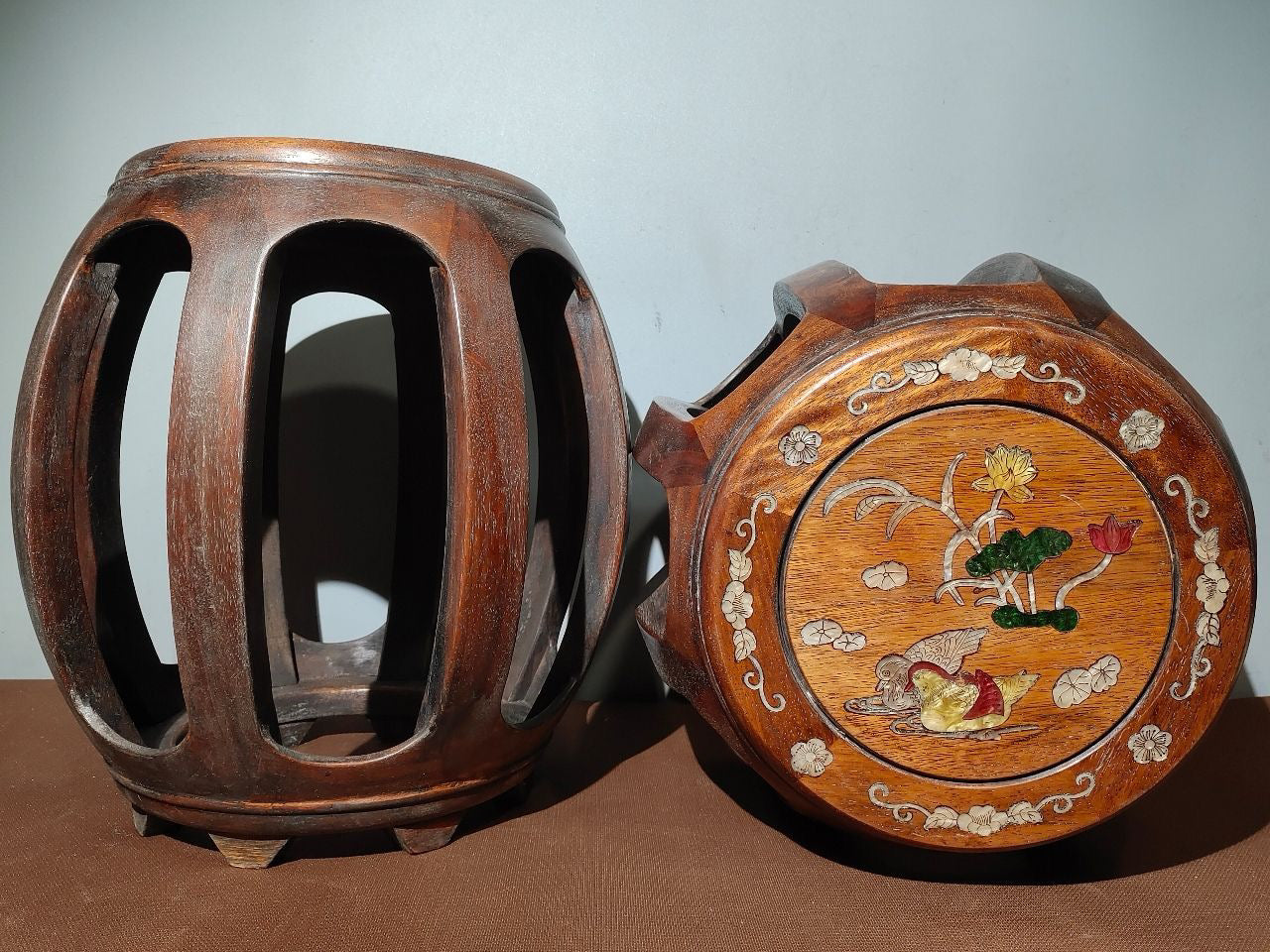 A pair of Chinese antique rosewood colored seashells and drum stools