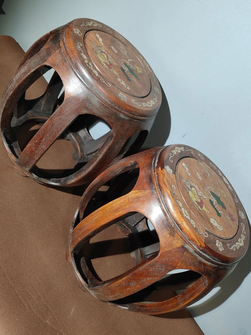 A pair of Chinese antique rosewood colored seashells and drum stools