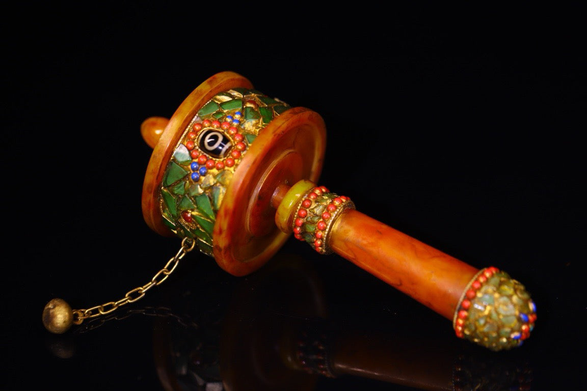 Handmade with flowing honey wax, inlaid with gemstones, the celestial bead spinning wheel