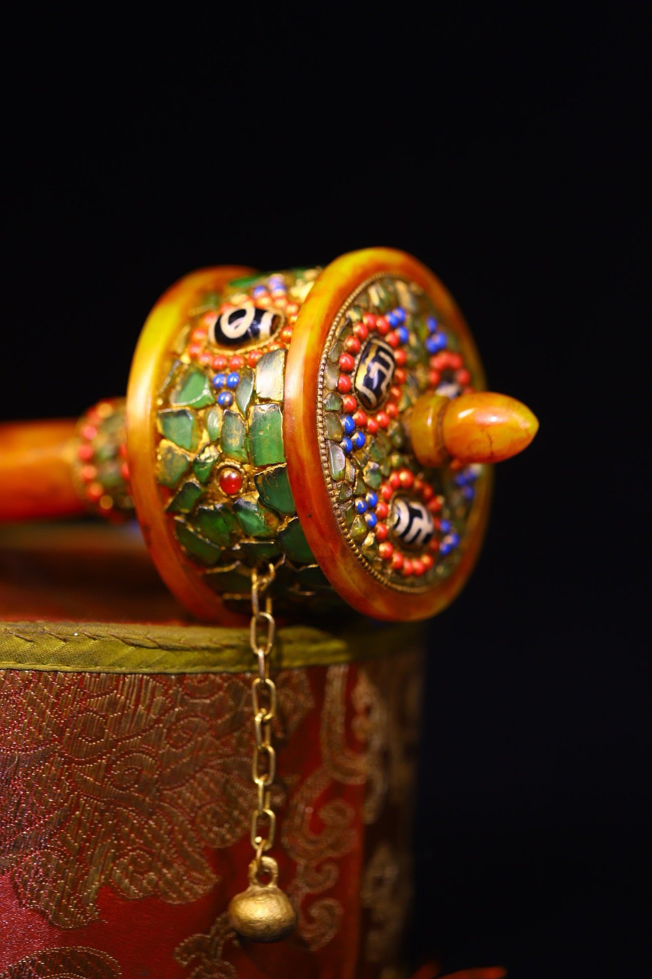 Handmade with flowing honey wax, inlaid with gemstones, the celestial bead spinning wheel