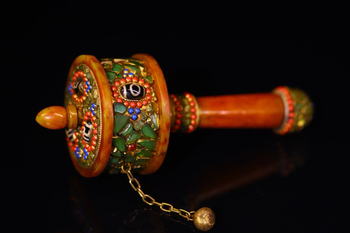 Handmade with flowing honey wax, inlaid with gemstones, the celestial bead spinning wheel