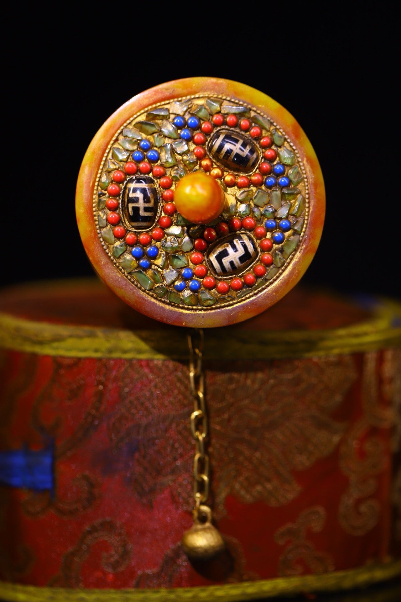 Handmade with flowing honey wax, inlaid with gemstones, the celestial bead spinning wheel