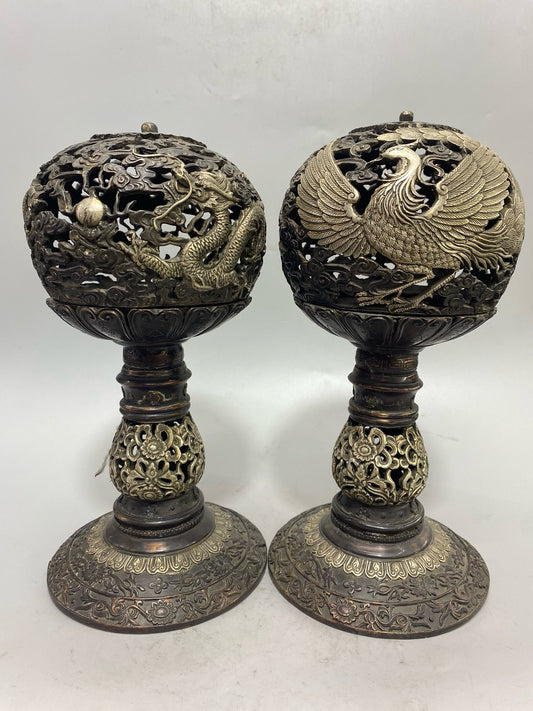 A pair of Chinese antique pure copper gilded silver dragon and phoenix aromatherapy furnaces