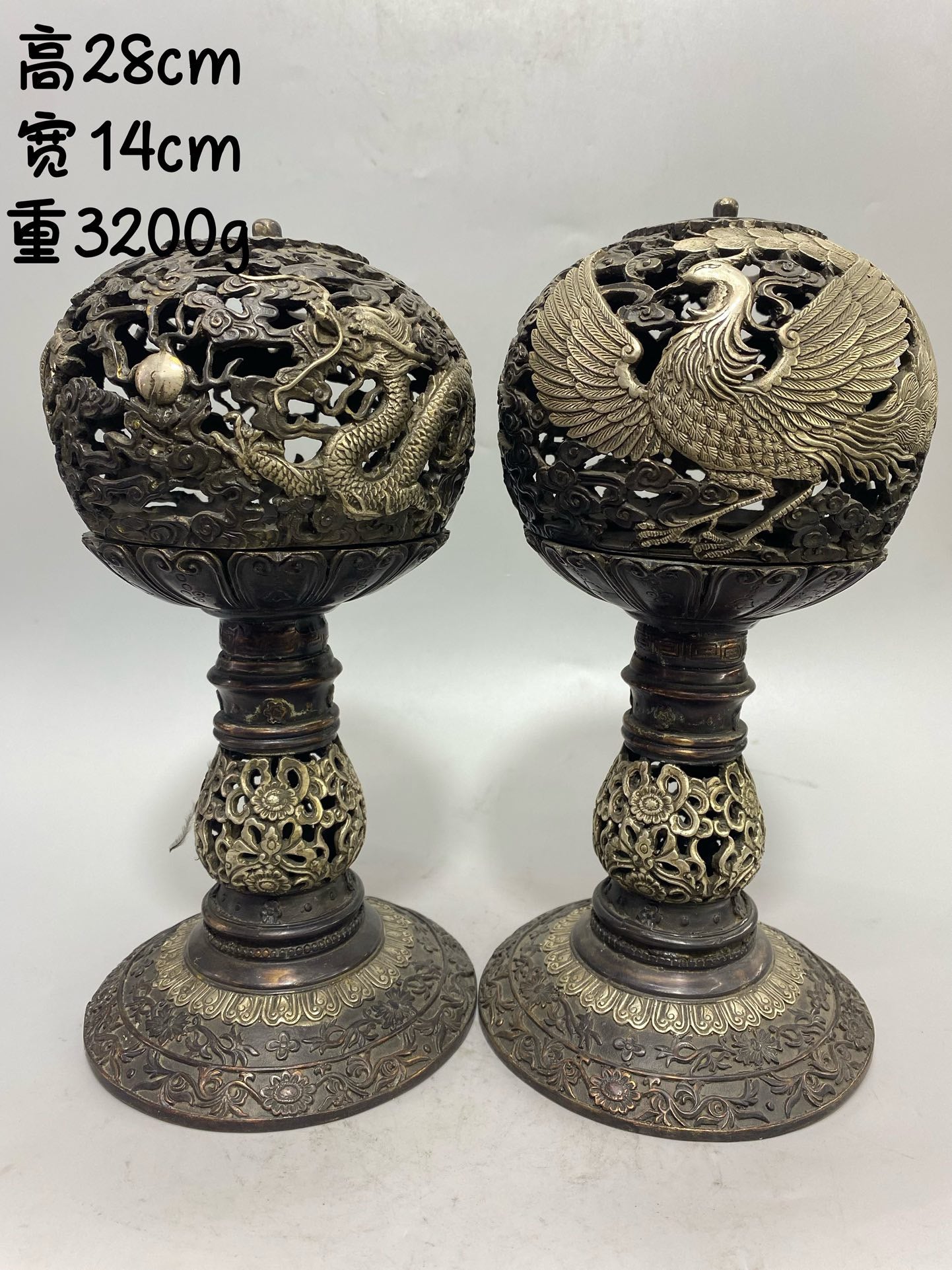 A pair of Chinese antique pure copper gilded silver dragon and phoenix aromatherapy furnaces