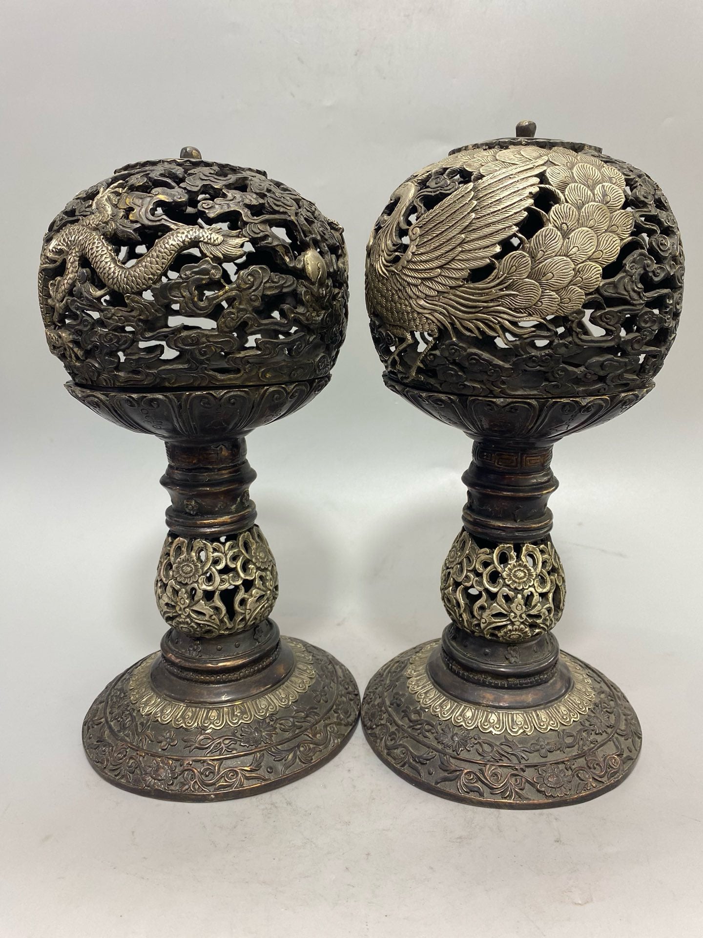 A pair of Chinese antique pure copper gilded silver dragon and phoenix aromatherapy furnaces