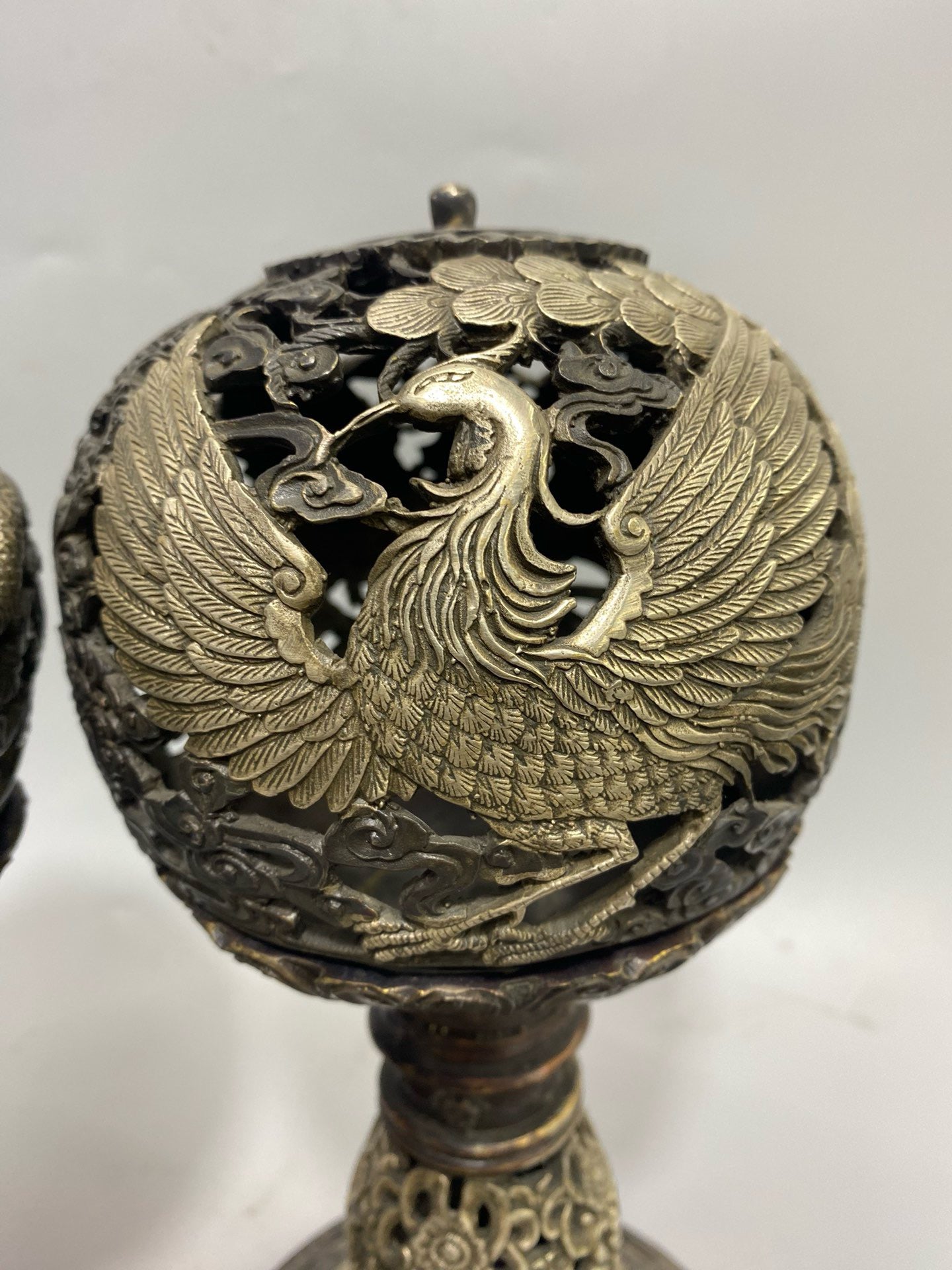 A pair of Chinese antique pure copper gilded silver dragon and phoenix aromatherapy furnaces