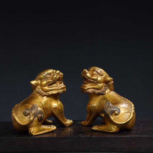 A pair of Chinese antique pure copper [lion] ornaments