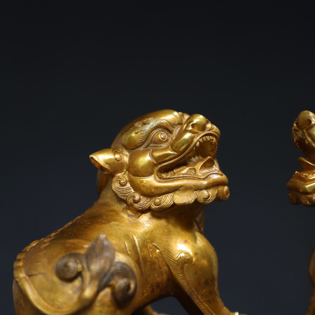 A pair of Chinese antique pure copper [lion] ornaments