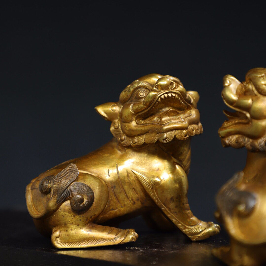 A pair of Chinese antique pure copper [lion] ornaments